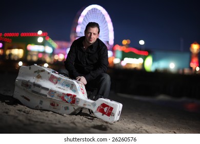 Musician With Travel Cello Or Guitar Case