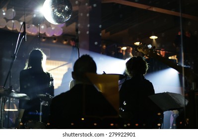 Musicians Band Playing In Modern Bar - Restaurant