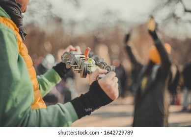 Musicians performance in festival outdoor. Artist playing, singing music on stage at sunset. Summer artistic events for people concept. Focus on 
tambourine. - Powered by Shutterstock