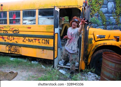 MUSKOGEE, OK - Sept. 12: Bloody Zombies Hide In School Bus During The Castle Zombie Run At The Castle Of Muskogee In Muskogee, OK On September 12, 2015. 
