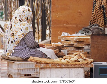 Muslim Arab Woman Baking Bread, Preparing Cakes, Soft Focus