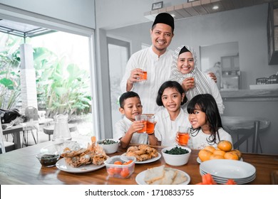 Muslim Asian Family Breaking The Fast Together Having Some Sweet Drink