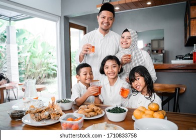 Muslim Asian Family Breaking The Fast Together Having Some Sweet Drink