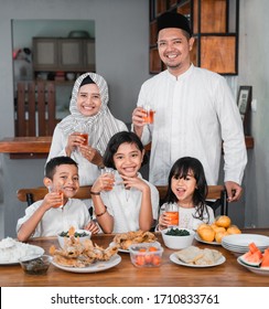 Muslim Asian Family Breaking The Fast Together Having Some Sweet Drink