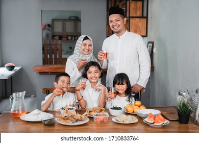 Muslim Asian Family Breaking The Fast Together Having Some Sweet Drink