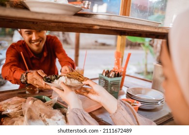 Muslim Asian Woman Preparing Her Food Stall