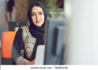 Muslim Asian Woman Working In Office With Laptop