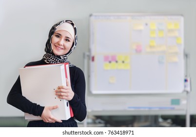 Muslim Asian Woman Working In Office 