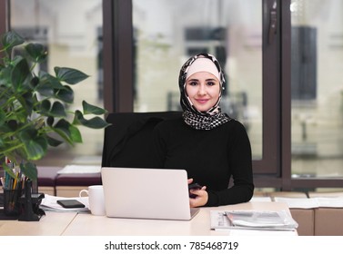 Muslim Asian Woman Working In Office With Laptop