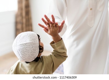 Muslim Boy Giving A High Five