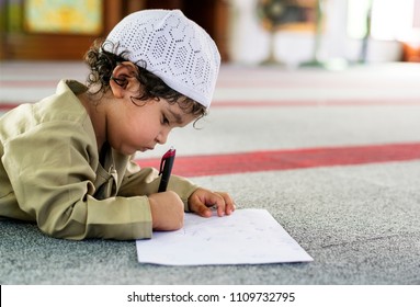 Muslim Boy Learning In A Mosque