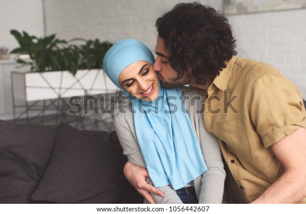 Muslim Boyfriend Kissing Girlfriend Hijab Home Stock Photo 1056442607 ...