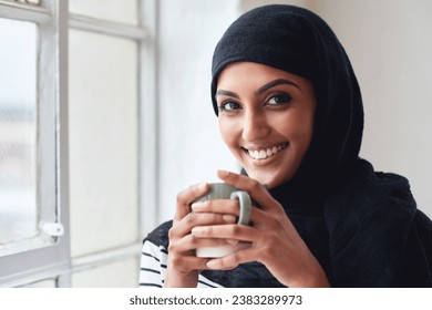 Muslim business woman, portrait and coffee with smile, happiness or relax by office window for energy. Young islamic executive, hijab and happy for espresso drink, matcha or motivation for leadership - Powered by Shutterstock