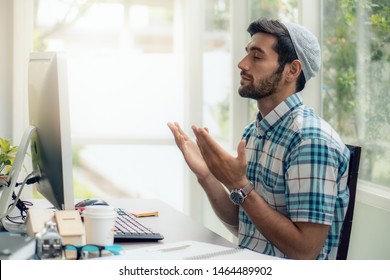 Muslim Businessman Praying And Having Dua To Allah Asking For His Business Success While Working At Home