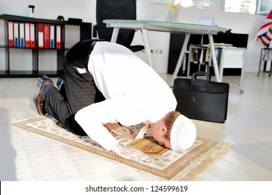 Muslim Businessman Praying At Office