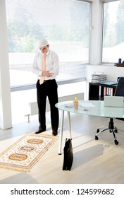 Muslim Businessman Praying At Office