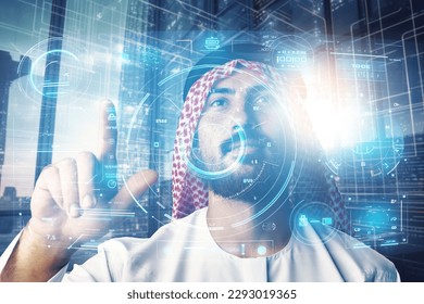 Muslim businessman working with floating data visualization screen - Powered by Shutterstock