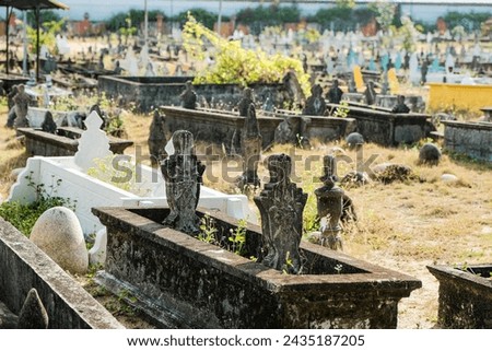 A muslim cemetry filled with lots of thombstones