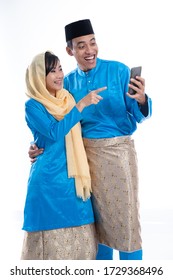 Muslim Couple Talk To Family Using Smartphone Isolated Over White Background