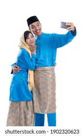 Muslim Couple Talk To Family Using Smartphone Isolated Over White Background