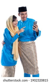 muslim couple talk to family using smartphone isolated over white background