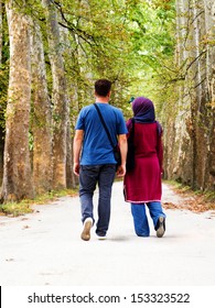 Muslim Couple Walking