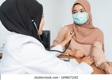 Muslim Doctor Hear Patient Heart Beat With Stethoscope