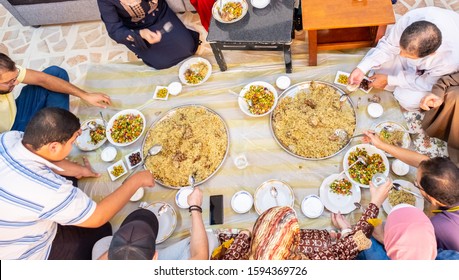 Muslim Family Gathering For Iftar In Ramadan