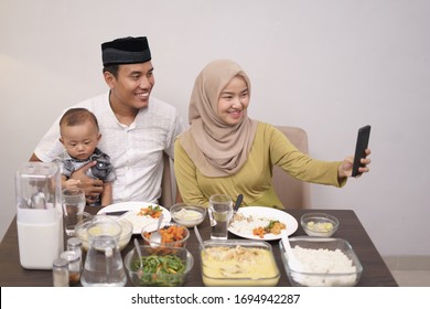 Muslim Family Make Video Phone Call While Dinner At Home