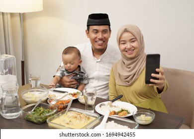 Muslim Family Make Video Phone Call While Dinner At Home