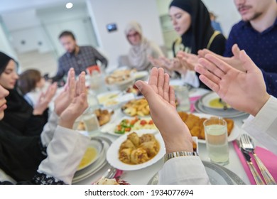 Muslim Family Making Iftar Dua To Break Fasting During Ramadan.