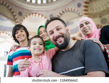 Muslim family portrait in masjid
