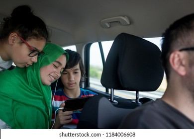 Muslim family traveling with car - Powered by Shutterstock