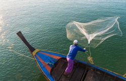 Muslim Fisherman Fishing Nets,Andaman Sea Off The Coast, Ranong Southern Thailand 