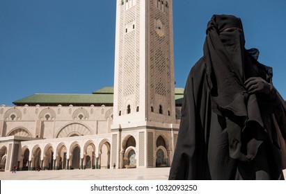 A muslim girl in burka during ramadan in Hassan II mosque in Casablanca.  - Shutterstock ID 1032093250