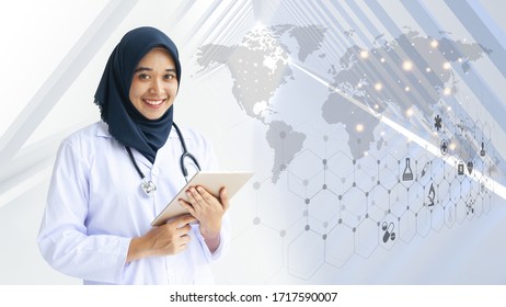 Muslim Girl Doctors Wear Hijab With Advanced Medical Equipment, Stethoscope And Tablet Computers Epidemiological Research Various Types Of Coronavirus Virus, Medical Care Concepts. 