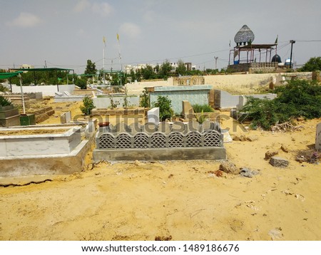 A Muslim graveyard with alot of graves