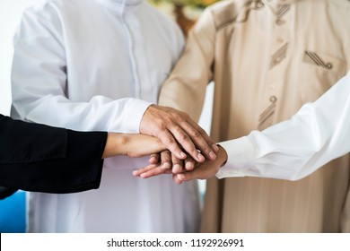 Muslim Group Of Friends Stacking Hands