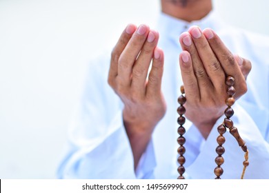 Muslim Islam Man In White Session Lift Two Hand For Praying ,isolated On White Background.concept For Islamic Pray, Ramadan, Eid Al Fitr, Eid Ad-ha, Meditation