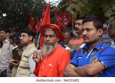 A Muslim Left Activist Wears A Red Dress Listen His Leader Speech About Scam In  Protest Rally Organized By Left Party In Front Of CBI Regional Head Quarter On January 12, 2015 In Calcutta, India.