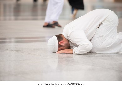 Muslim man enjoying his visit to holy mosque