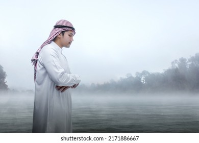 Muslim Man With Keffiyeh With Agal In Praying Position (salat) At Outdoor