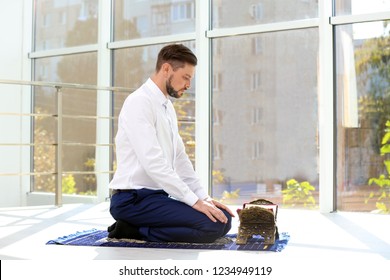 Muslim Man Koran Praying On Rug Stock Photo 1234949119 | Shutterstock