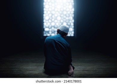 Muslim man praying in the mosque - Shutterstock ID 2140178001