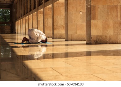 Muslim Man Praying In The Mosque 