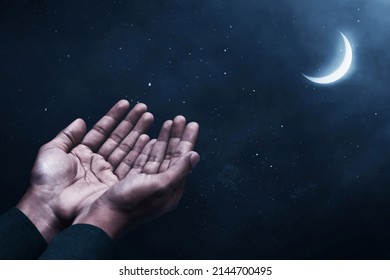 Muslim man praying on night sky moon - Shutterstock ID 2144700495