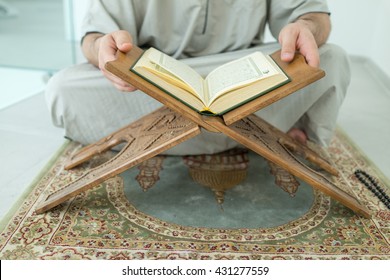 A Muslim Man Is Reading Quran