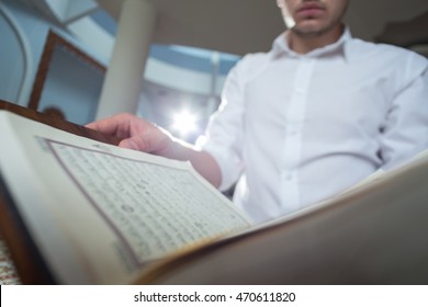 A Muslim Man Is Reading Quran.