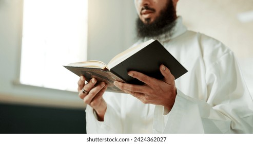 Muslim man, reciting and mosque for reading quran with faith, idea or culture for worship, praise or study. Islamic person, religion and peace in book, prayer and thinking for meditation in Palestine - Powered by Shutterstock