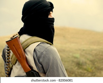 Muslim militant with rifle